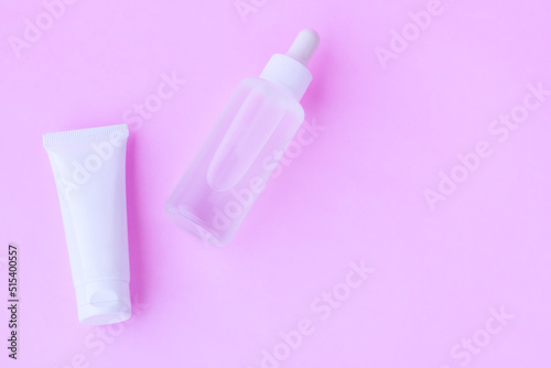 Cosmetic bottles on pink background,Beauty products