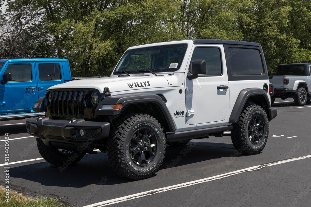 Jeep Wrangler display at a Stellantis dealership. Jeep offers the