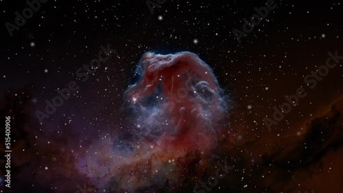 Fly towards the Horsehead Nebula in the constellation of Orion. Zooming into the Horsehead Nebula. Wide field video of Barnard 33. photo