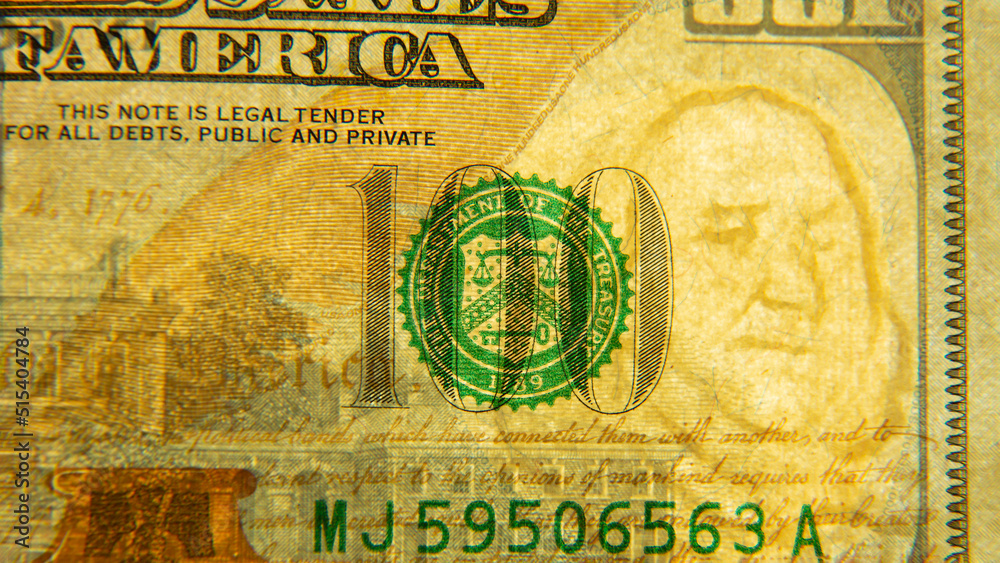 Naklejka premium A hundred-dollar bill in close-up with a watermark.