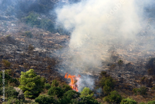 A UN helicopter puts out a fire in a forest on the Israel-Lebanon border.