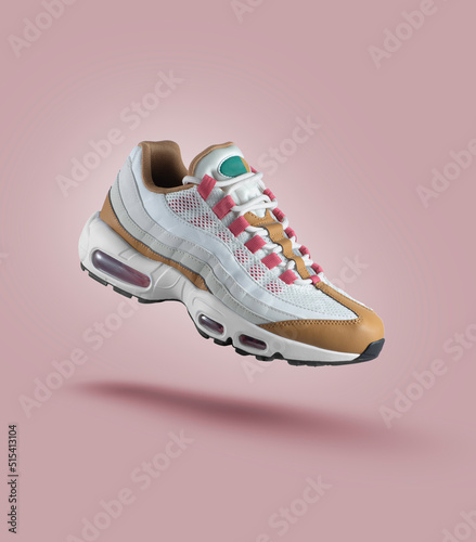 White sneaker with colored accents on a pink gradient background, men's fashion, sport shoe,  air, sneakers, lifestyle, concept, product photo,  levitation concept, street wear, trainer