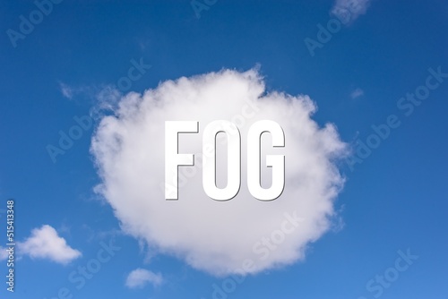 FOG - word on the background of the sky with clouds.