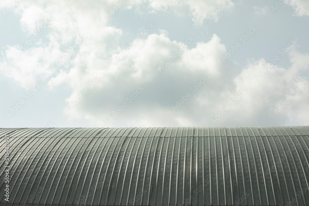 Warehouse building made of steel. Industrial architecture.