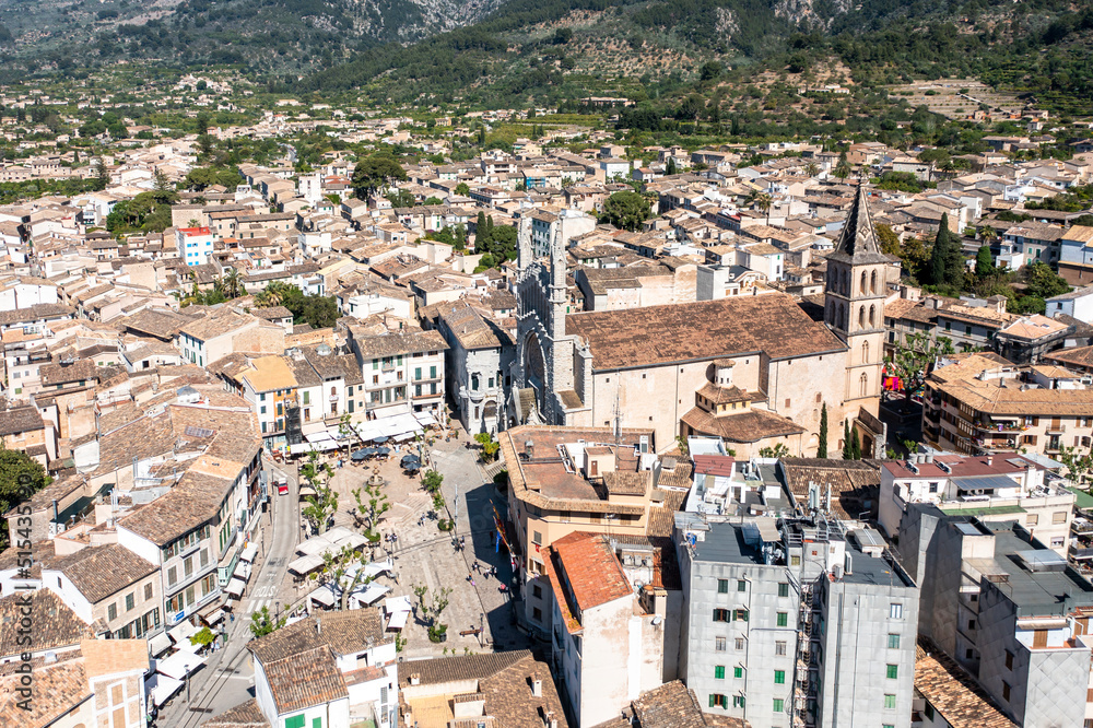 Helicopter view of the old town of Sóller, with the Church of St. Bartholomew, Roman Catholic parish church, Sóller, mountains behind, Serra de Tramuntana, Mallorca, Balearic Islands, Spain