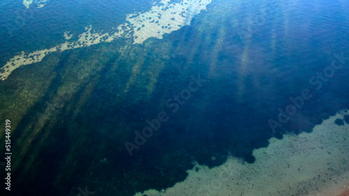Top view of the water surface near the coastline