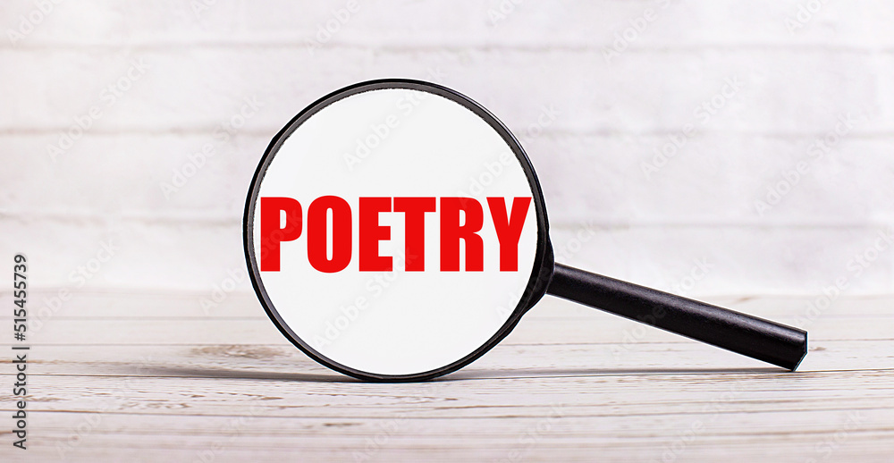 The magnifying glass stands vertically on a light background with the text POETRY The magnifying glass stands vertically on a light background with the text POETRY