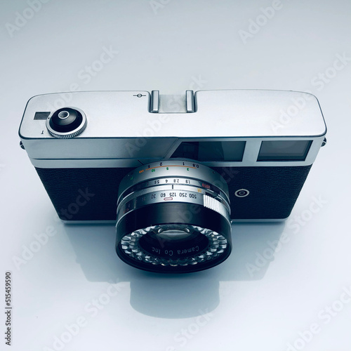Vintage analog camera on isolated light background | object