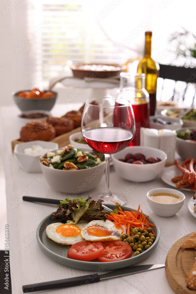 Many different dishes served on buffet table for brunch Many different dishes served on buffet table for brunch