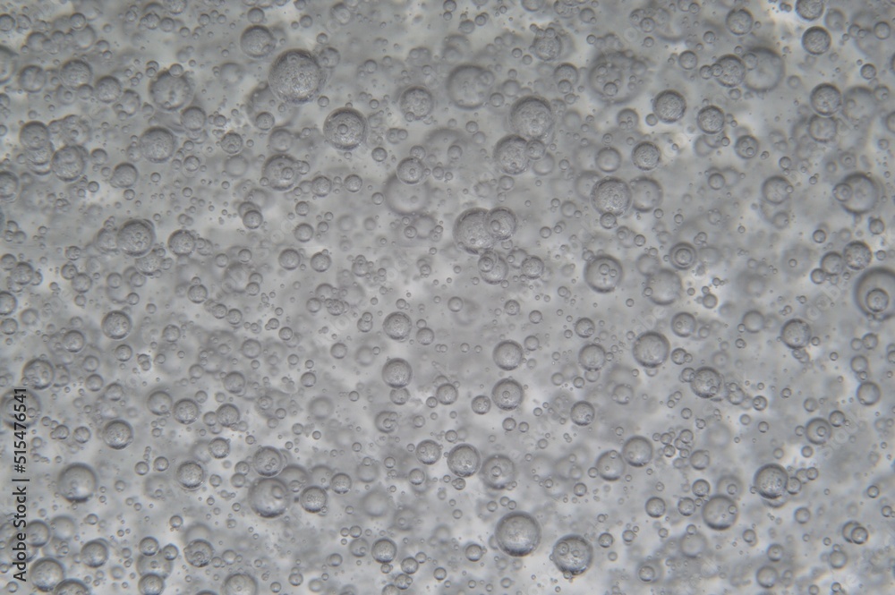air bubbles in a transparent liquid close-up. micro air bubbles in a transparent liquid close-up. micro