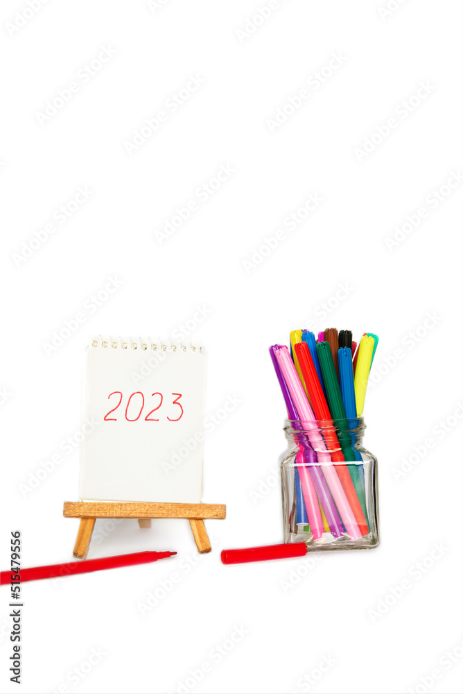 school stationery with markers and other supplies on white background. back to school concept school stationery with markers and other supplies on white background. back to school concept
