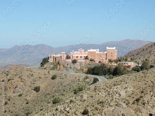Historic Arab fortress nestled in Morocco's Atlas Mountains, now transformed into a luxury hotel blending traditional architecture with mountain scenery.