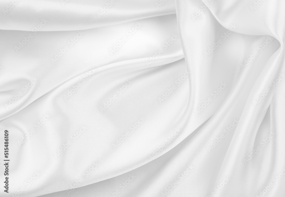 Naklejka premium Close-up of rippled white silk fabric texture background