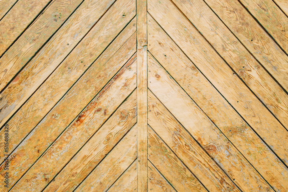 Fototapeta premium Background, texture of a wooden door, walls from old boards.