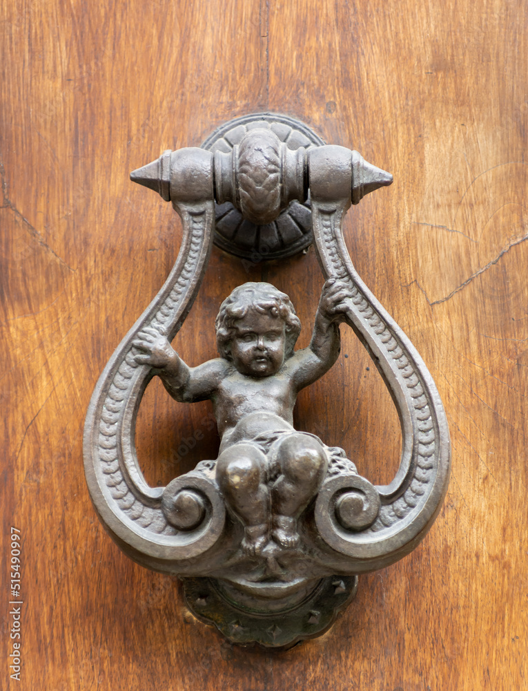 Clapper on Wooden Door in the Shape of Little Baby