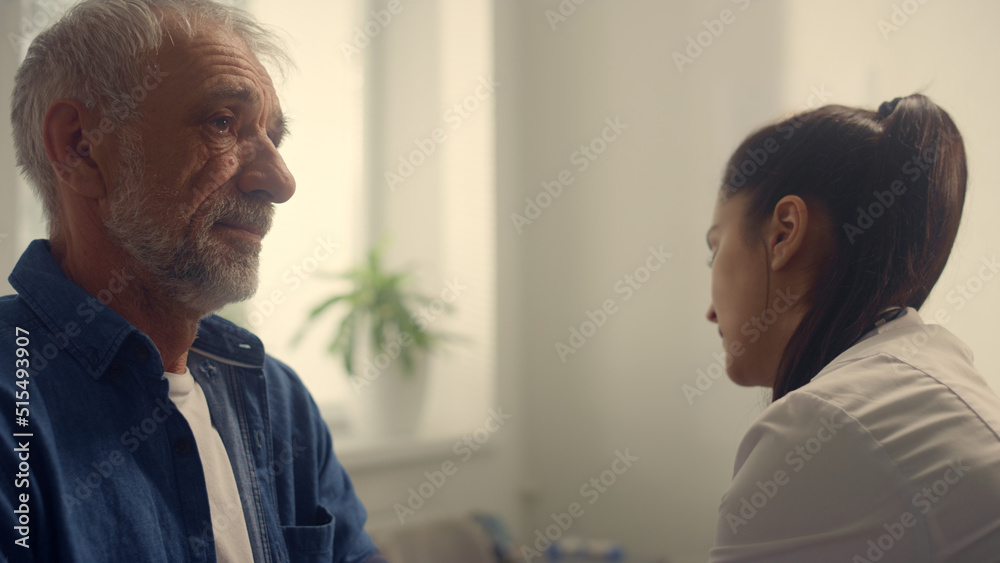 Woman cardiologist checkup blood pressure pensioner using tonometer closeup. Woman cardiologist checkup blood pressure pensioner using tonometer closeup.