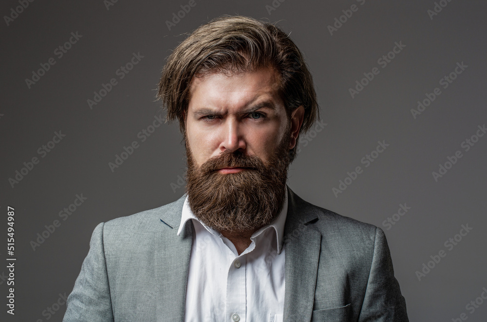 Man in suit. Male beard and mustache. Elegant man in business suit. Male in tuxedo. Elegant handsome man in suit. Handsome bearded businessman in classic suits Man in suit. Male beard and mustache. Elegant man in business suit. Male in tuxedo. Elegant handsome man in suit. Handsome bearded businessman in classic suits