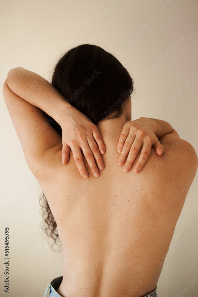 Cervical spine osteochondrosis is radicular syndromes of young woman. Attractive girl feel spine pain because of spinal nerves compression. Cervical spine osteochondrosis is radicular syndromes of young woman. Attractive girl feel spine pain because of spinal nerves compression.