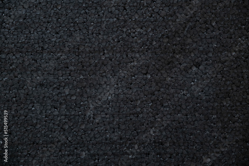 Black styrofoam backgraound and close up photo