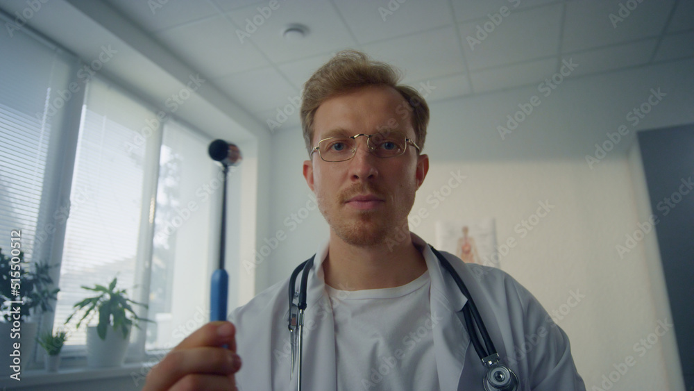Pov video physician checking eye reflex using neurological hammer close up. Pov video physician checking eye reflex using neurological hammer close up.