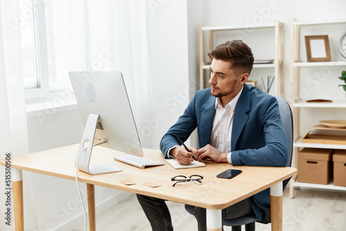 businessmen sitting at the computer work boss documentation executive