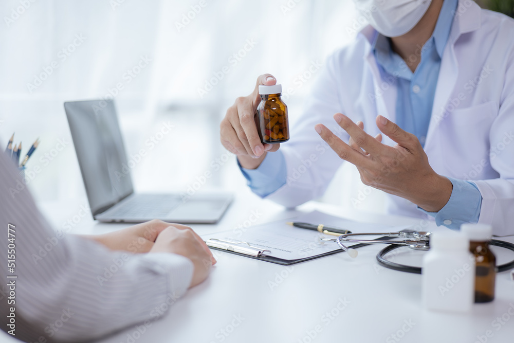 Close-up hands of doctor and patient in medical office. Close-up hands of doctor and patient in medical office.