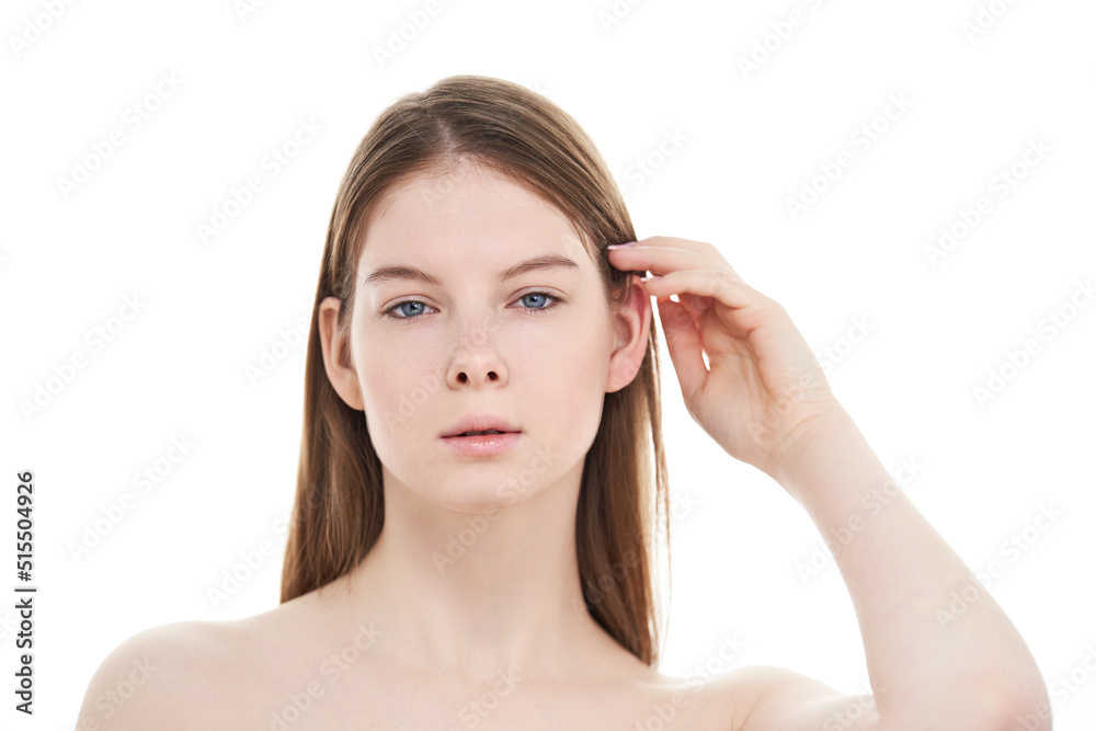 Young woman with perfect clean skin on white background.