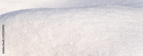 Banner. Winter snow. Snow texture Top view of the snow. Texture for design. Snowy white texture. Snowflakes.