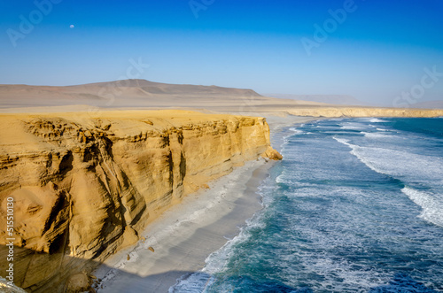 Supay beach at Paracas National Reserve with bright moon in Background - Reserva Nacional de Paracas, Ica, Peru