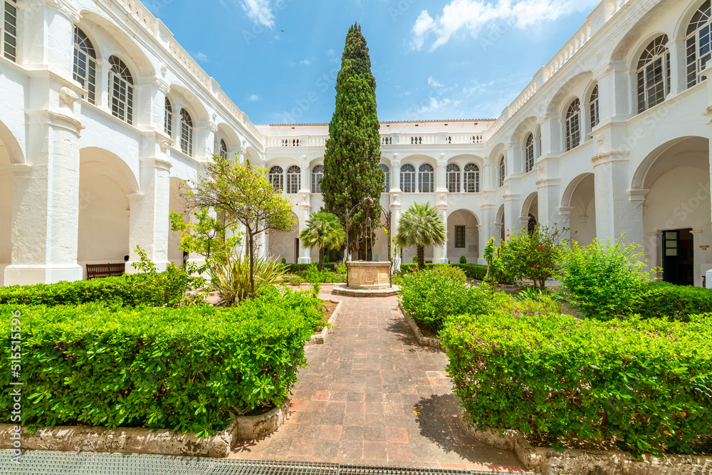 The picturesque inner courtyard of the cloisters of the Convent de Sant Agustí and and Església dels Socors in the historic center of the Old Town.