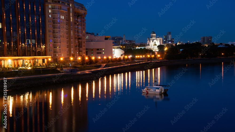 summer night on the Iset river in the city center. Yekaterinburg, Russia.