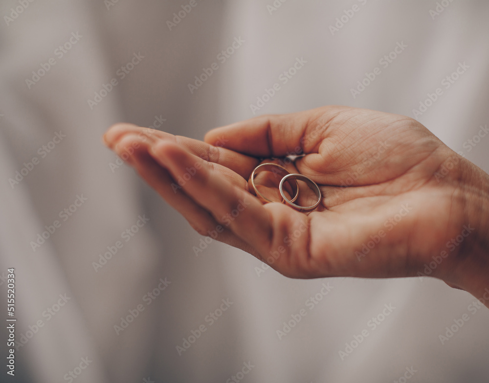 wedding rings in hands. Sensual. Wedding ring. Finger. Hands. Bride wedding rings in hands. Sensual. Wedding ring. Finger. Hands. Bride