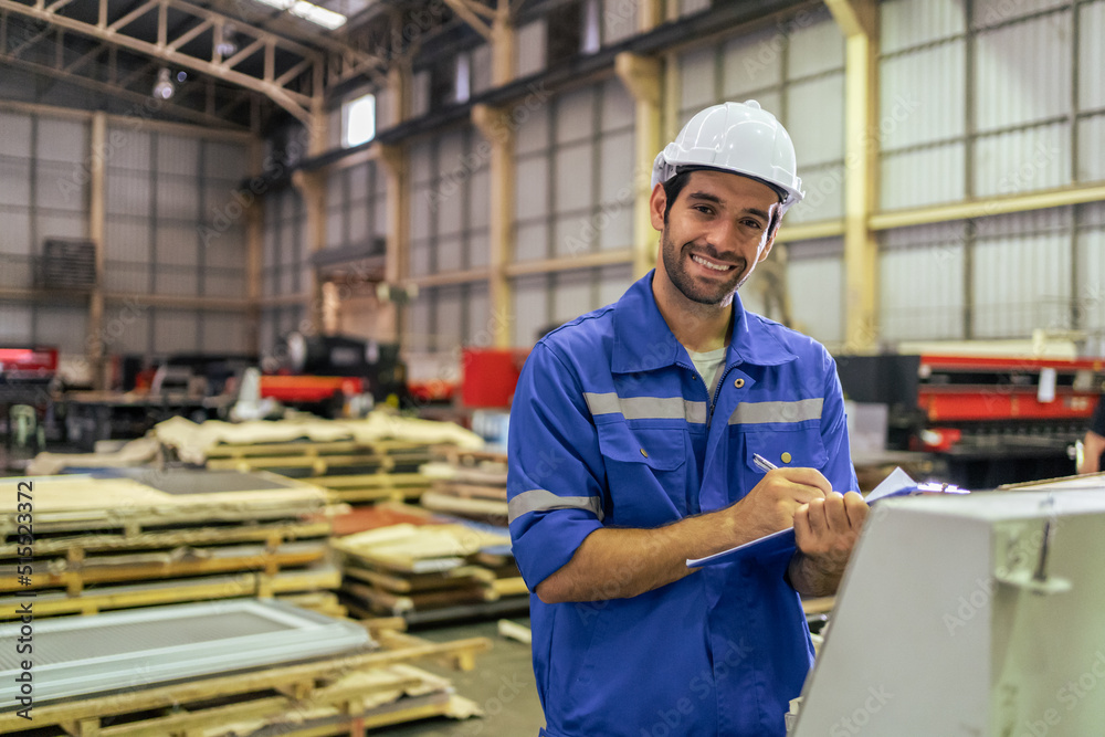 Portrait of Caucasian man industry worker working in factory warehouse