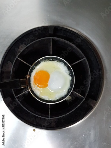 top view fried eggs in a pan