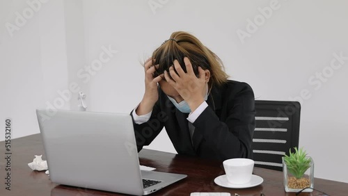 Tired asia business woman with headache at office, feeling sick at work.