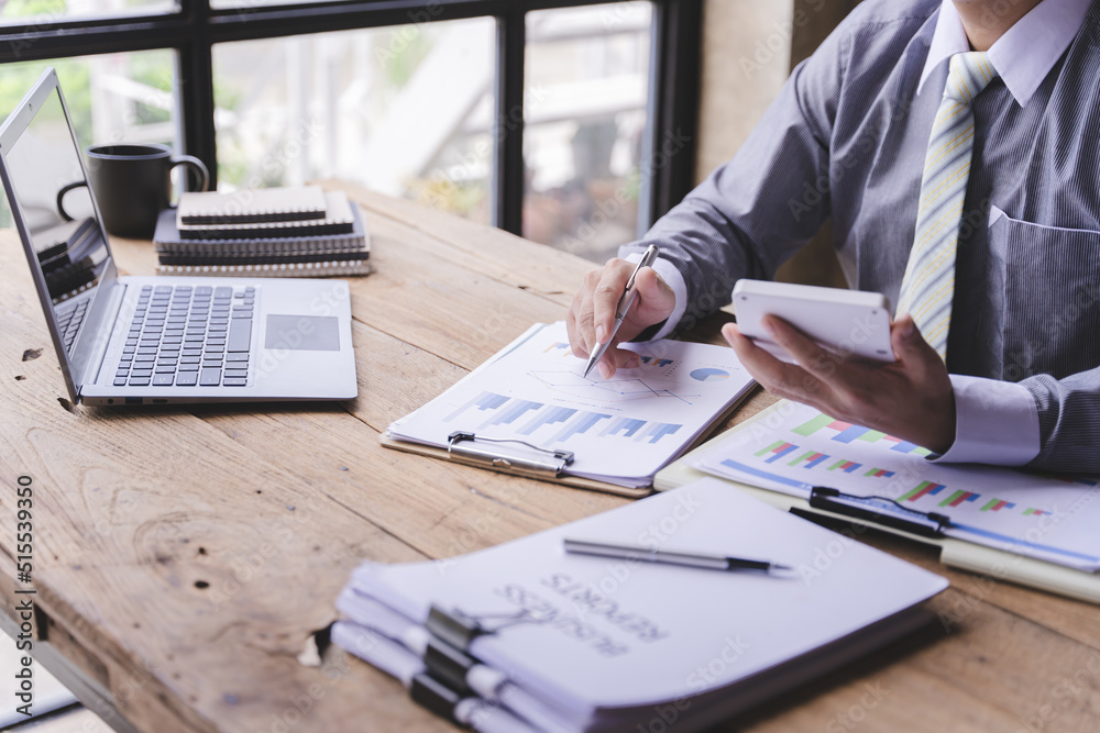 The financiers are calculating personal taxes for their customers. The financiers are calculating personal taxes for their customers.
