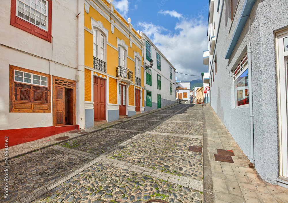 Colorful buildings in the streets of Santa Cruz de La Palma. Houses or homes built in a vintage architecture design in a small town or village. The bright and vibrant city for vacations or holidays