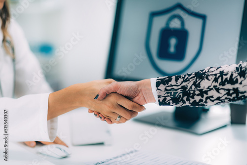Fotografie Handshake After Signing Medical Data Form