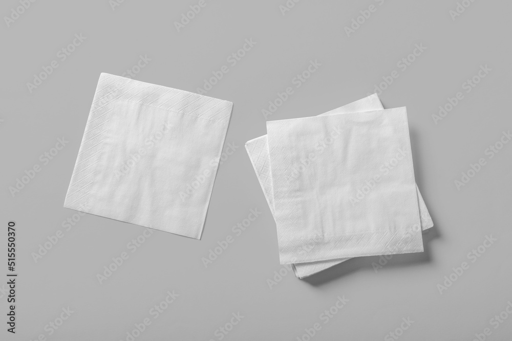 Paper napkin stack mockup copy space for your logo or graphic design - obrazy, fototapety, plakaty 