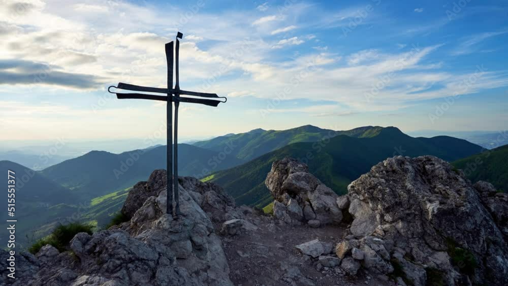 Christian cross on the top of Limestone Mountain, panoramic view of the mountain ridge.Timelapse 4K Christian cross on the top of Limestone Mountain, panoramic view of the mountain ridge.Timelapse 4K