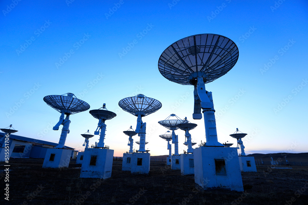 The silhouette of a radio telescope The silhouette of a radio telescope