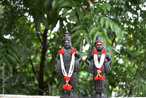 Lord Vithal and Rukhmini idols in black colour photo
