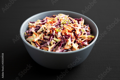 Tableau sur toile Homemade Coleslaw with Cabbage and Carrots in a Bowl, low angle view