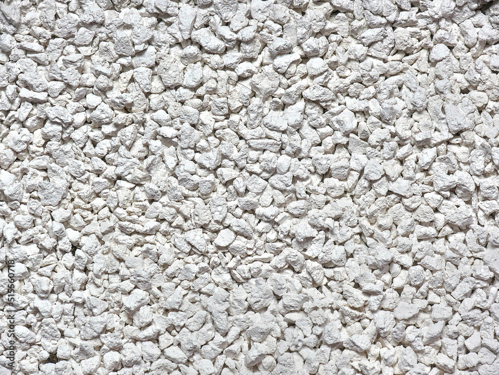 Close-up of cat litter or small porous white pebbles for texture or background. Close-up of cat litter or small porous white pebbles for texture or background.