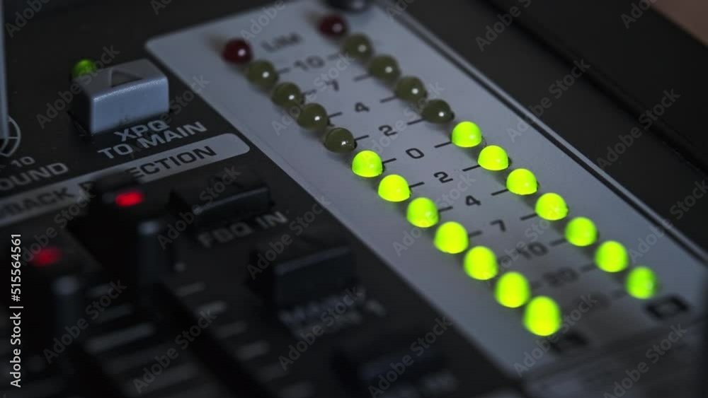 LED indicator of sound level signal on the mixing console. Closeup