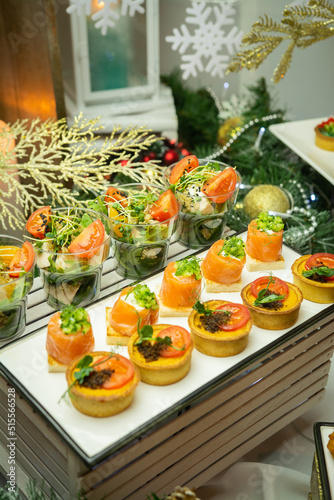 Fototapeta Naklejka Na Ścianę i Meble -  Mini snacks on the banquet table for a wedding