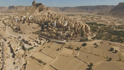 View to the city of Seiyun, Hadramaut valley, Yemen. Sayoun is a city in the Hadhramaut region of Yemen, today the largest city in the Hadhramaut Valley. (aerial photography)