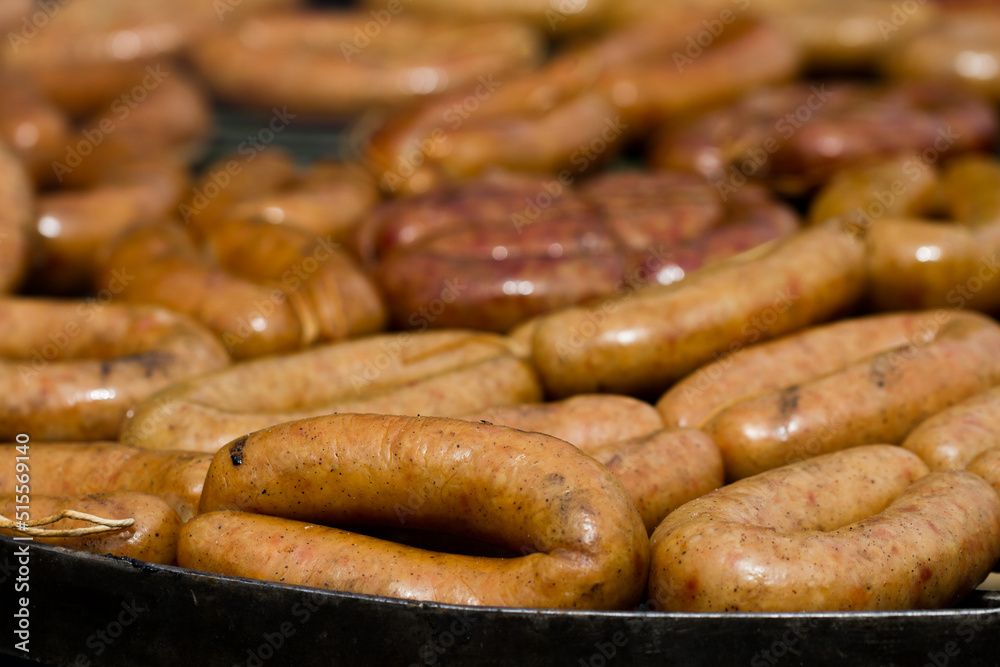 A bunch of appetizing sausages close-up. A bunch of appetizing sausages close-up.