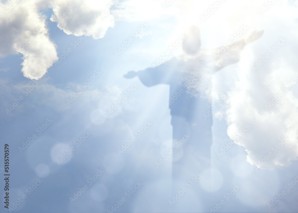 Ascension of Christ. Shining silhouette in the clouds - obrazy, fototapety, plakaty 