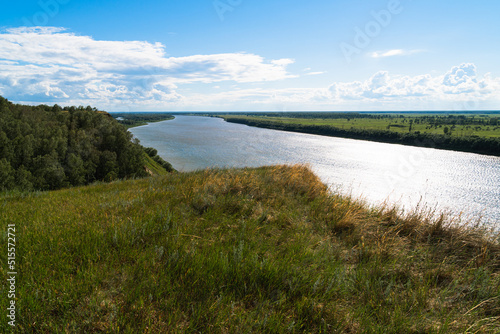 river view with high cliff in summer